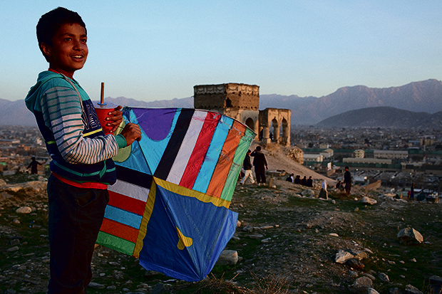 Andrew Quilty - Oculi –Kites from Kabul – V&A Museum of Childhood 620A young kite flier late in the afternoon on a Friday on the hill home to the tomb of Nader Khan Tomb - a popular place for kite flying - in Kabul.