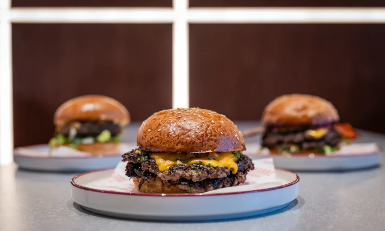 Three of the burgers featured on the menu.