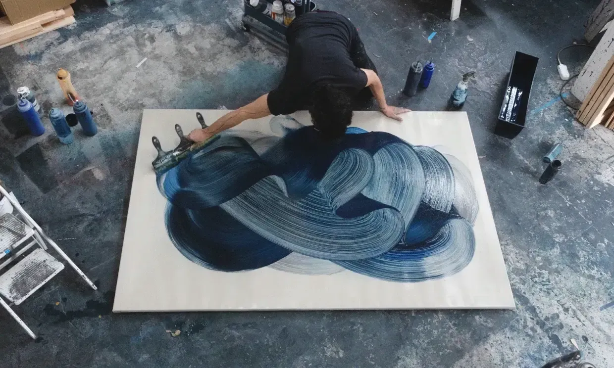 Bird's-eye view of Kostas Papakostas painting on canvas.