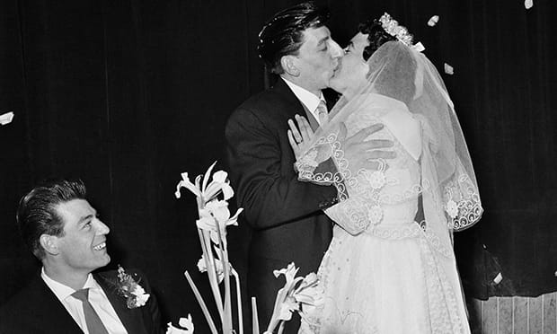 Embracing: A Hackney couple on their wedding day. Photograph courtesy of Stephen Gill