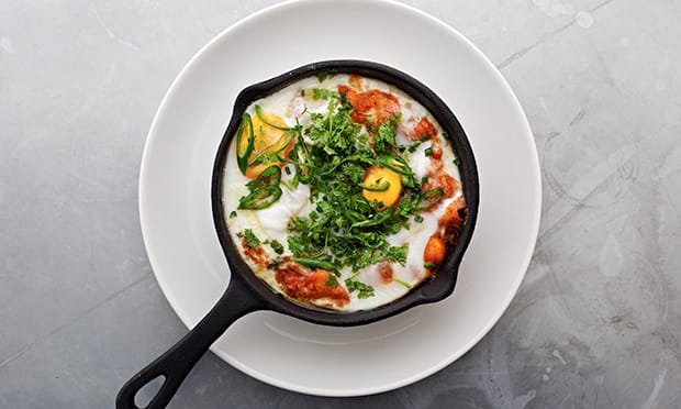 Baked eggs, spiced beans and peppers