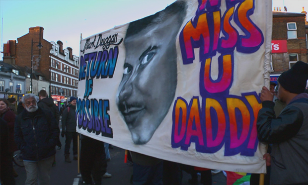 Protesters in Tottenham voicing their anger at the police shooting of Mark Duggan.